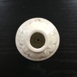 Ivory candle holder with barbotine decor