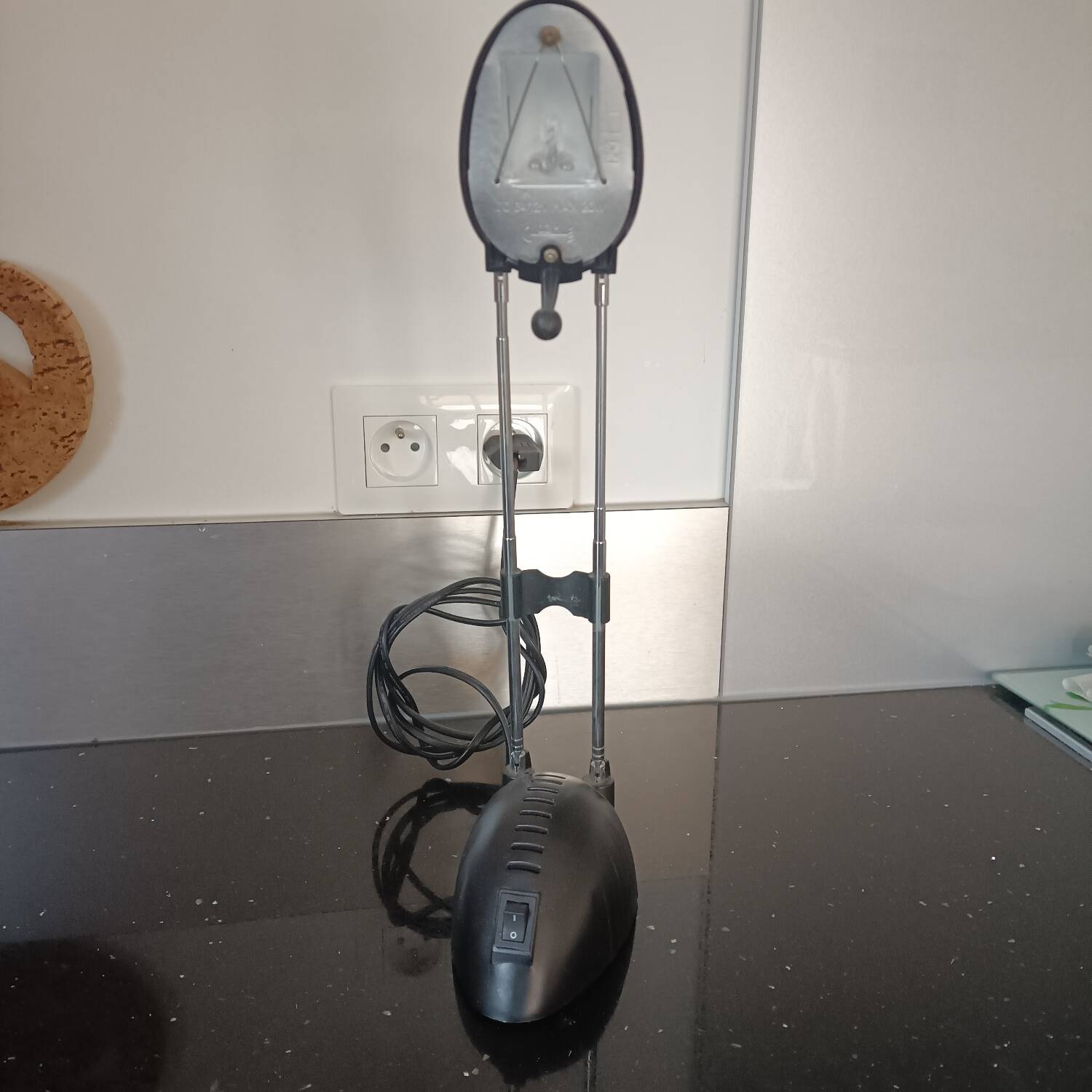 Black metal and brass table lamp