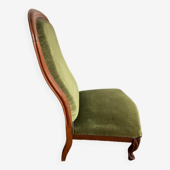 Green velvet armchair