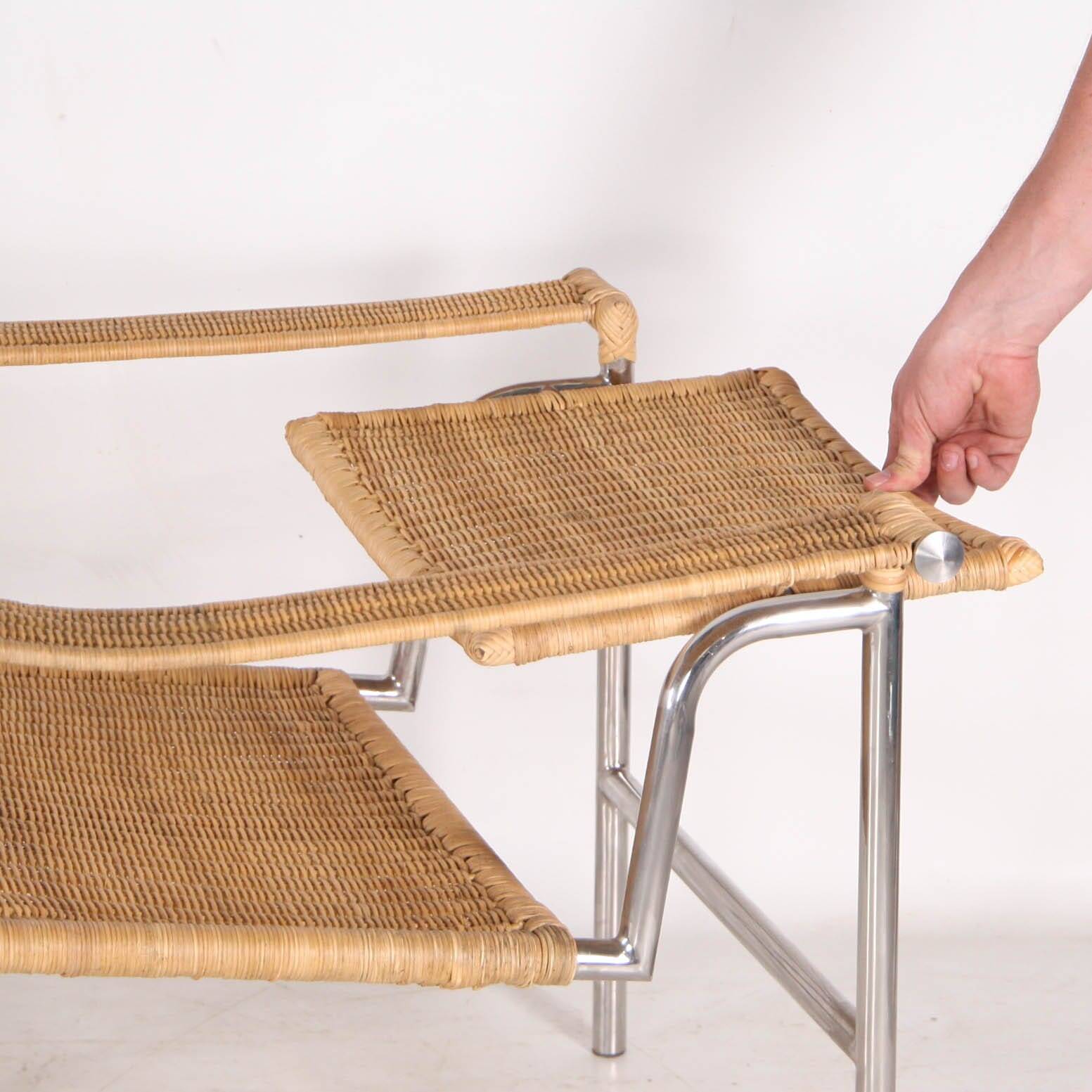 Pair of wicker and chrome armchairs
