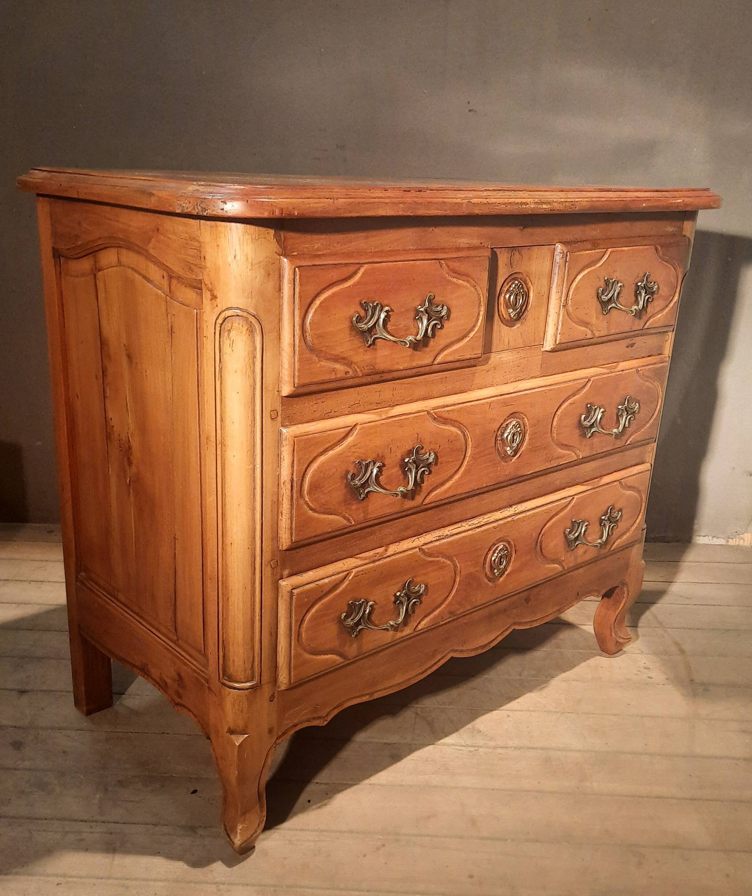 Louis XIV style commode in solid cherry wood.