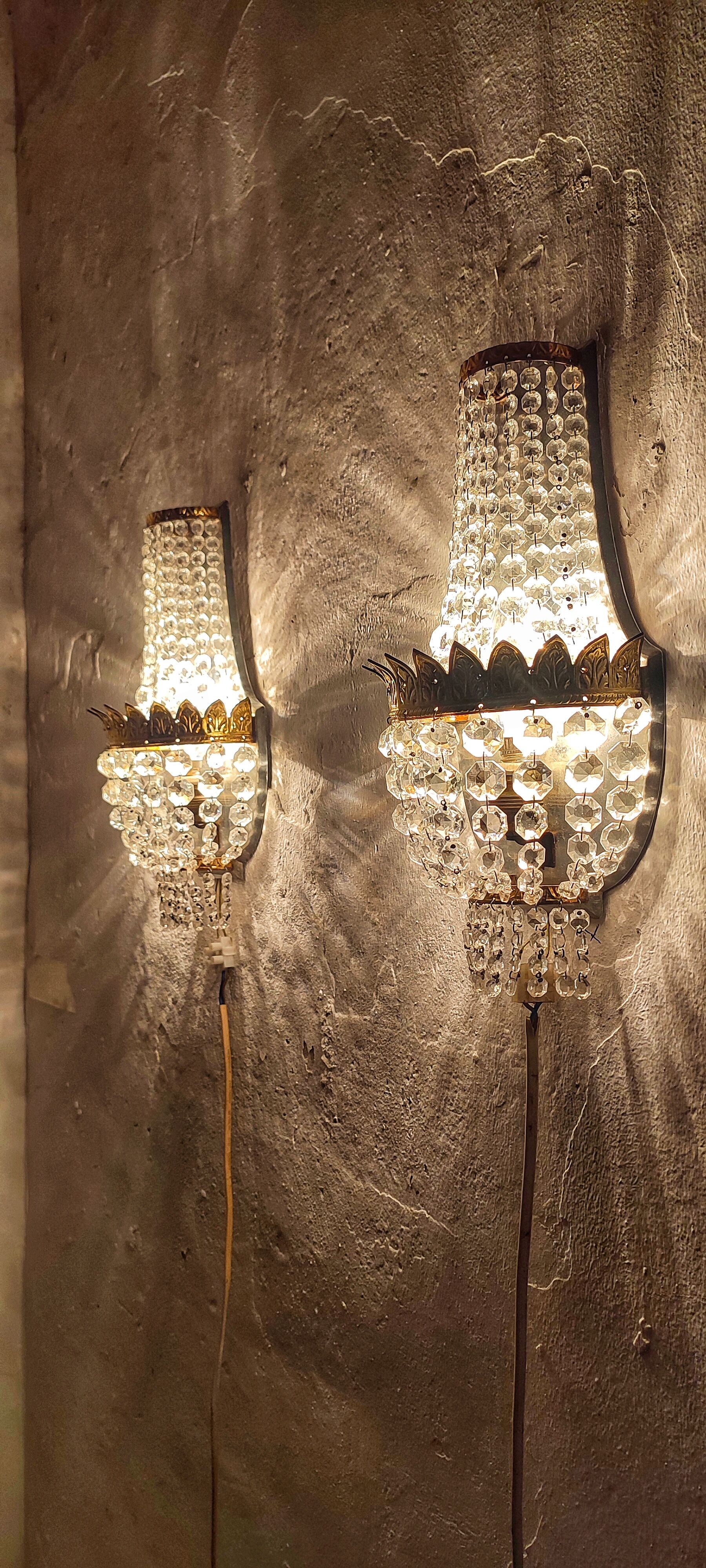 Classic crystal sconces. France 1950s.