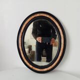 19th-century antique mirror in wood and stucco.