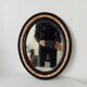 19th-century antique mirror in wood and stucco.