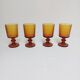 Set of 4 amber glass stemmed glasses