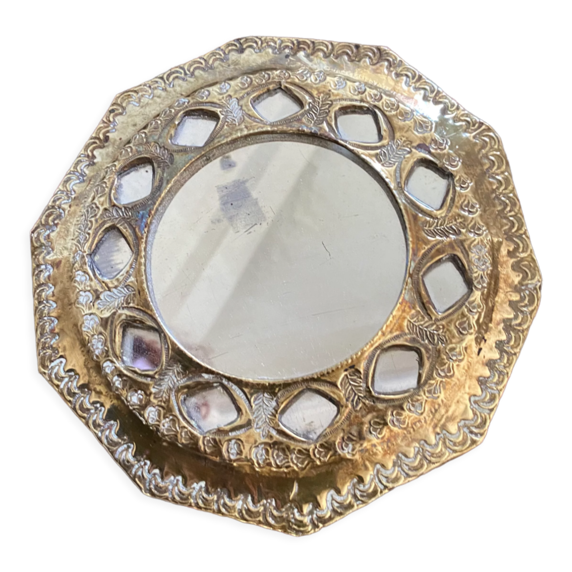 Antique mirror in worked brass