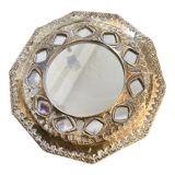 Antique mirror in worked brass