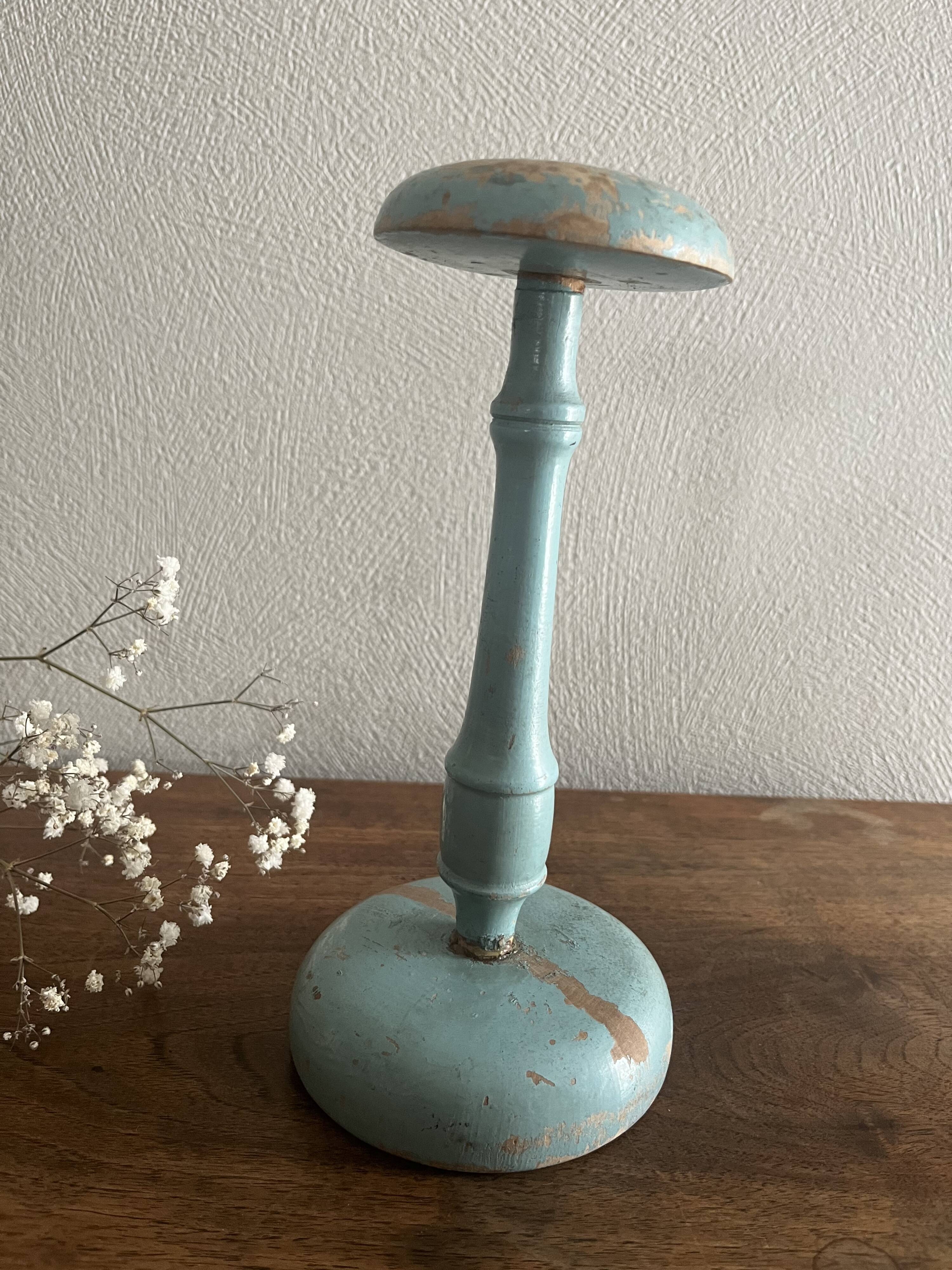 Weathered wooden hat rack