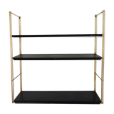Modular wall shelf in twisted brass