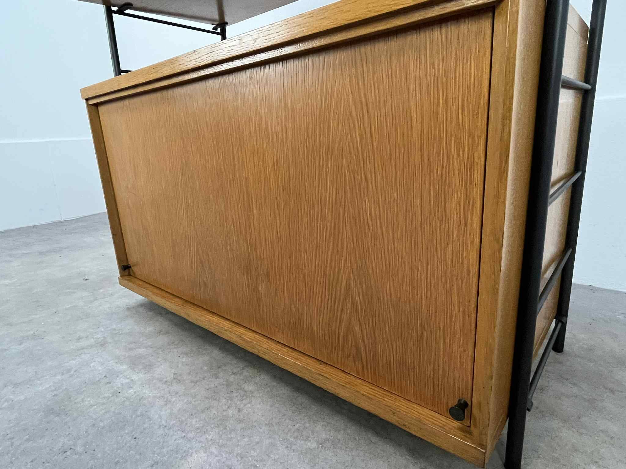 Modular shelf from the 1950s, wood and metal, vintage.