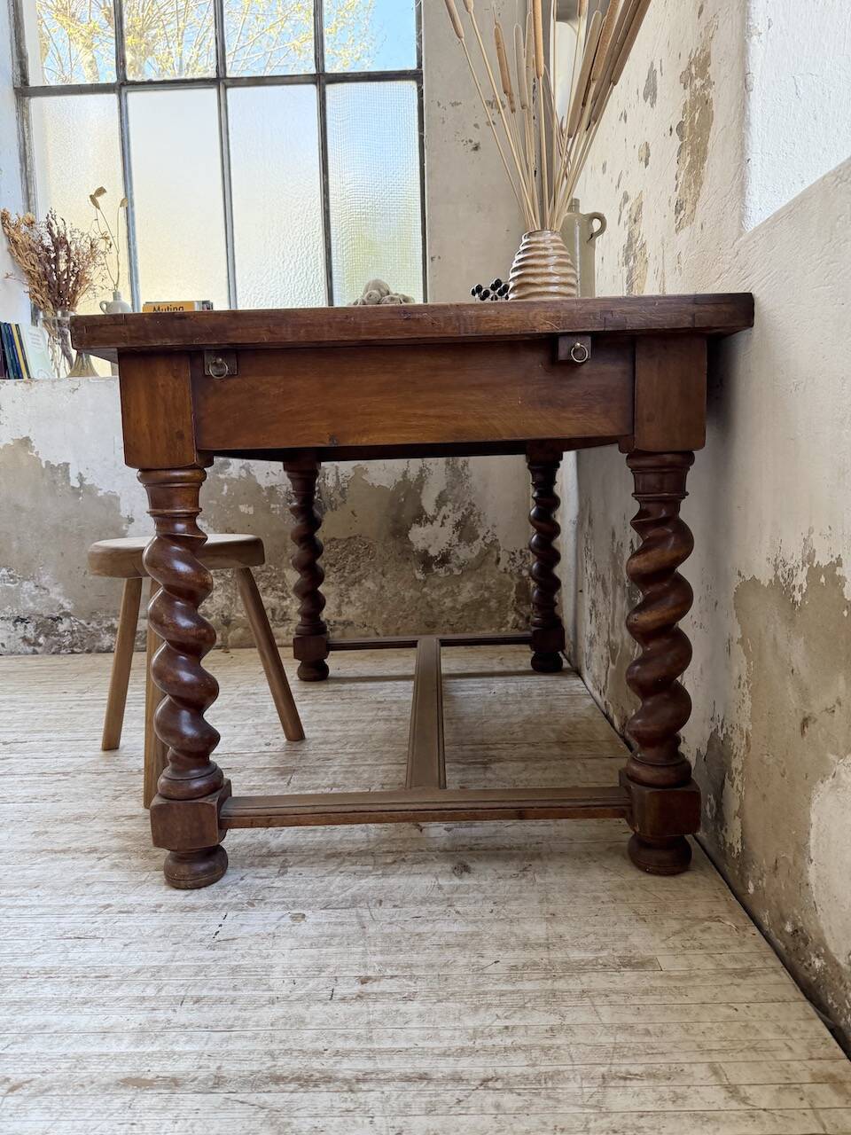 Paneled walnut desk with turned legs, 1900