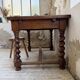 Paneled walnut desk with turned legs, 1900