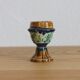 Late 19th-century earthenware egg cup in slipware
