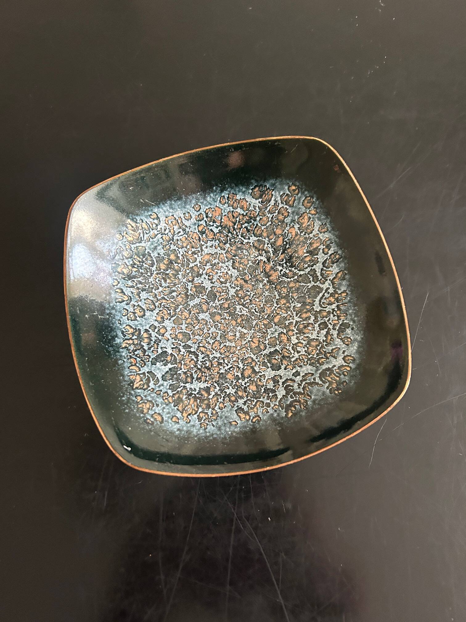 Expertic enamelled brass pocket emptier