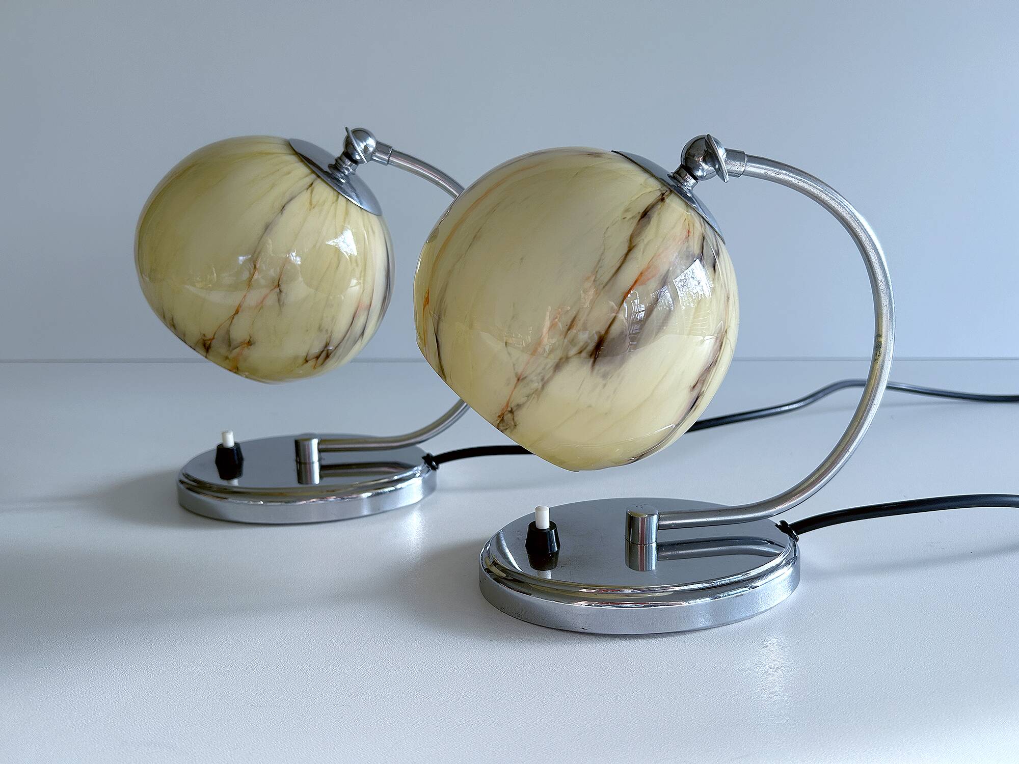 Pair of art deco lamps, chrome glass