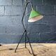 Industrial floor lamp in black lacquered metal and green enamelled sheet metal