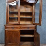 Buffet deux corps époque Napoléon III en bois massif.