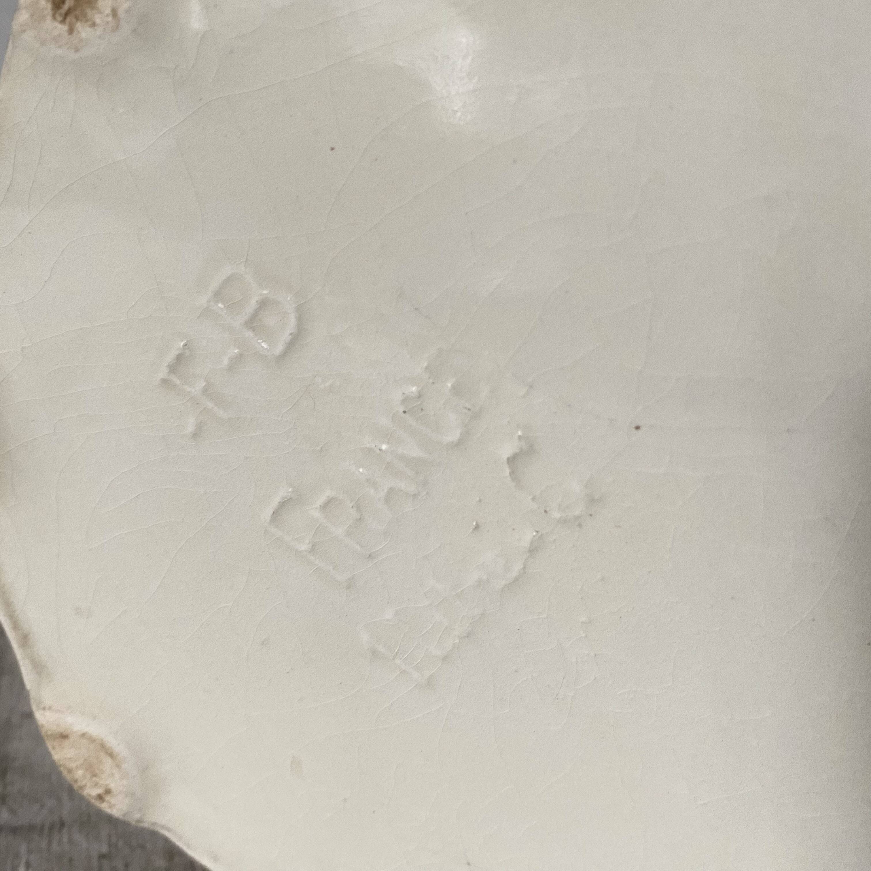 Antique pitcher in Apple slip