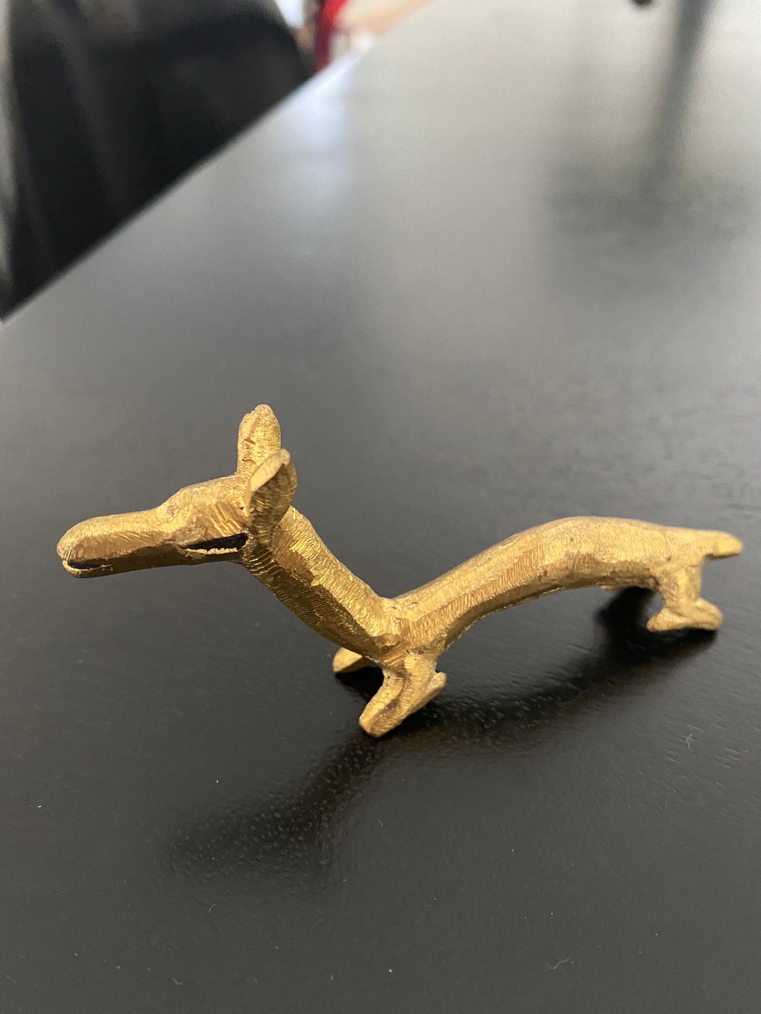 6 brass dromedary-shaped knife holders