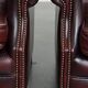 Ensemble de 2 fauteuils à oreilles en cuir de vache de style anglais