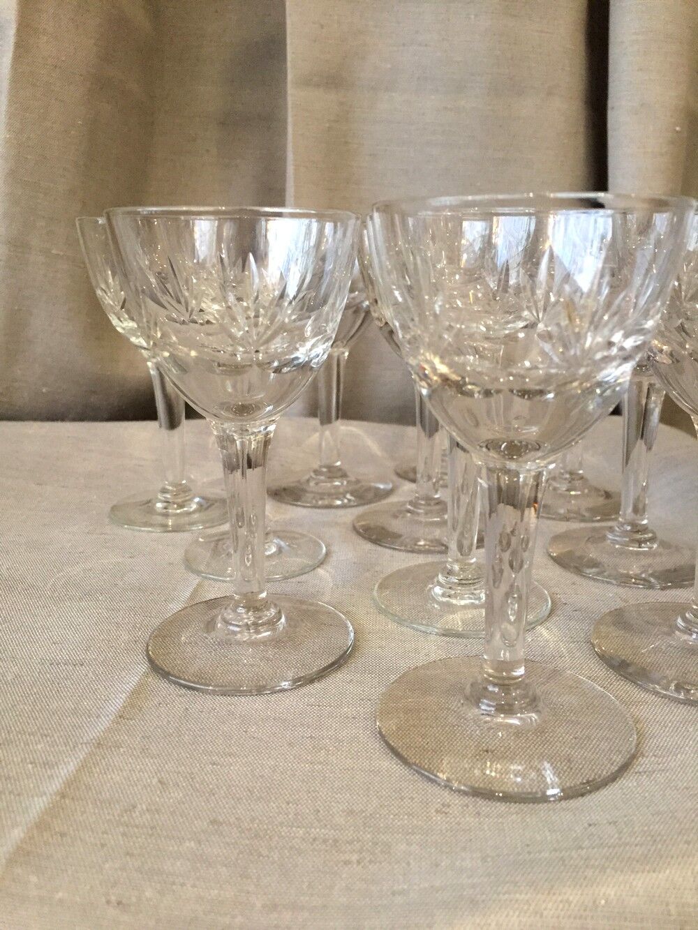Suite of 11 glasses on foot for the drop liqueur in glass cisele