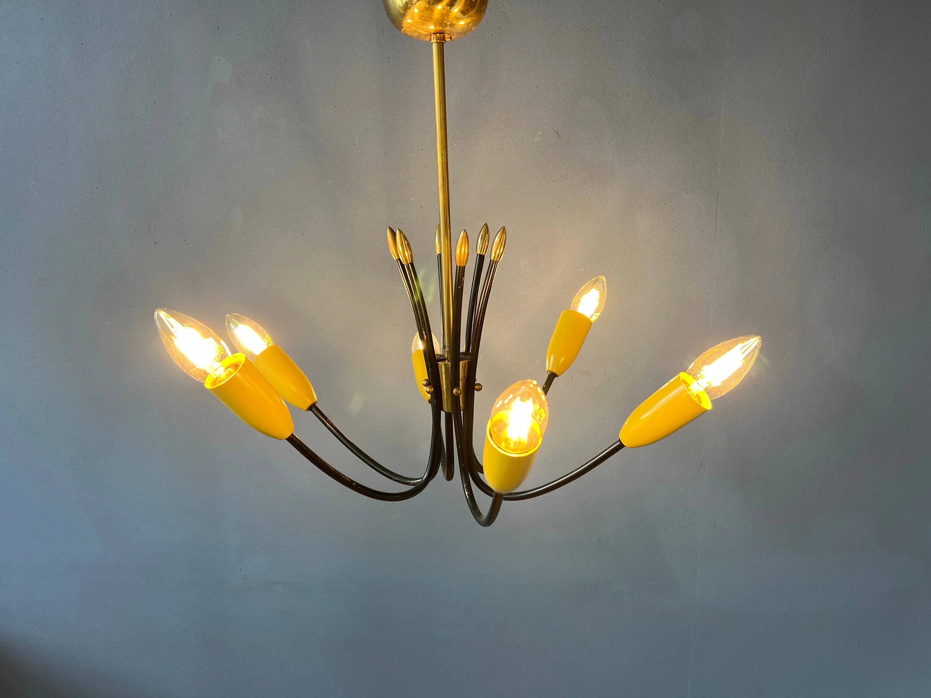 Vintage yellow spider suspension from the 1950s.