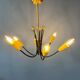 Vintage yellow spider suspension from the 1950s.