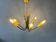 Vintage yellow spider suspension from the 1950s.