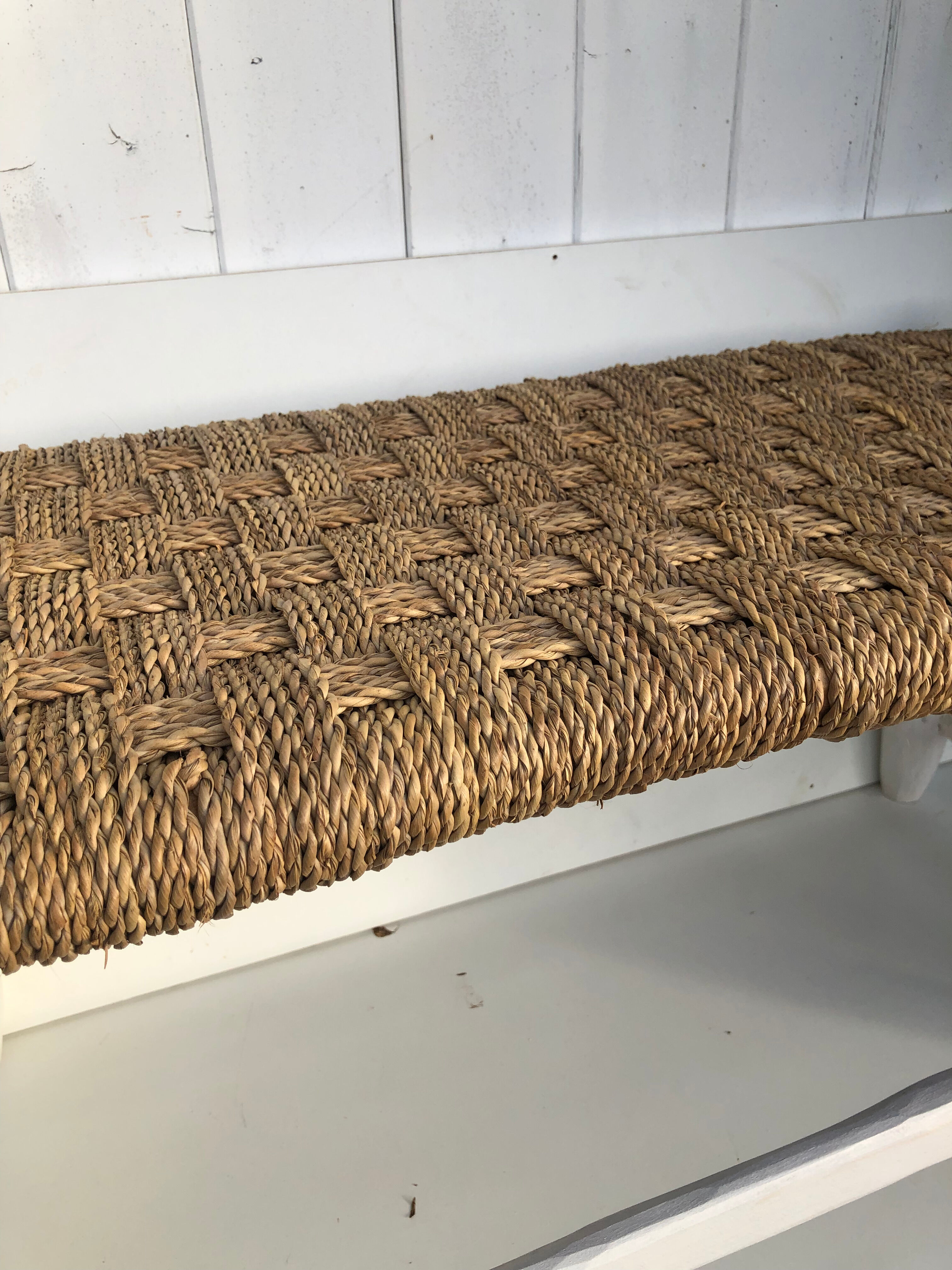 Wooden bench and rope