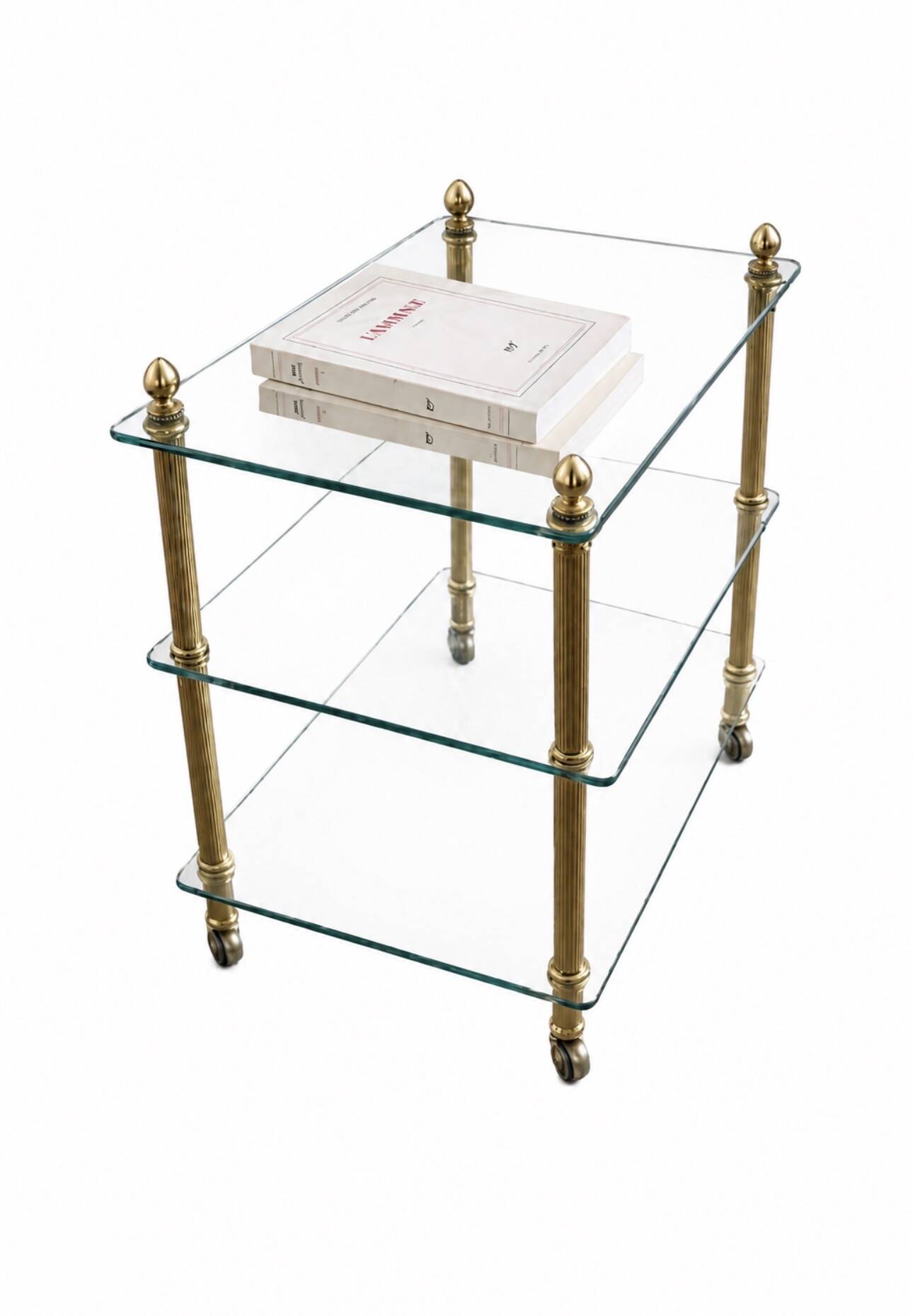 Elegant wheeled serving trolley in gilded brass and glass, in a spirit
