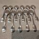 11 silver-plated dessert spoons by Christofle, Cluny pattern, striped