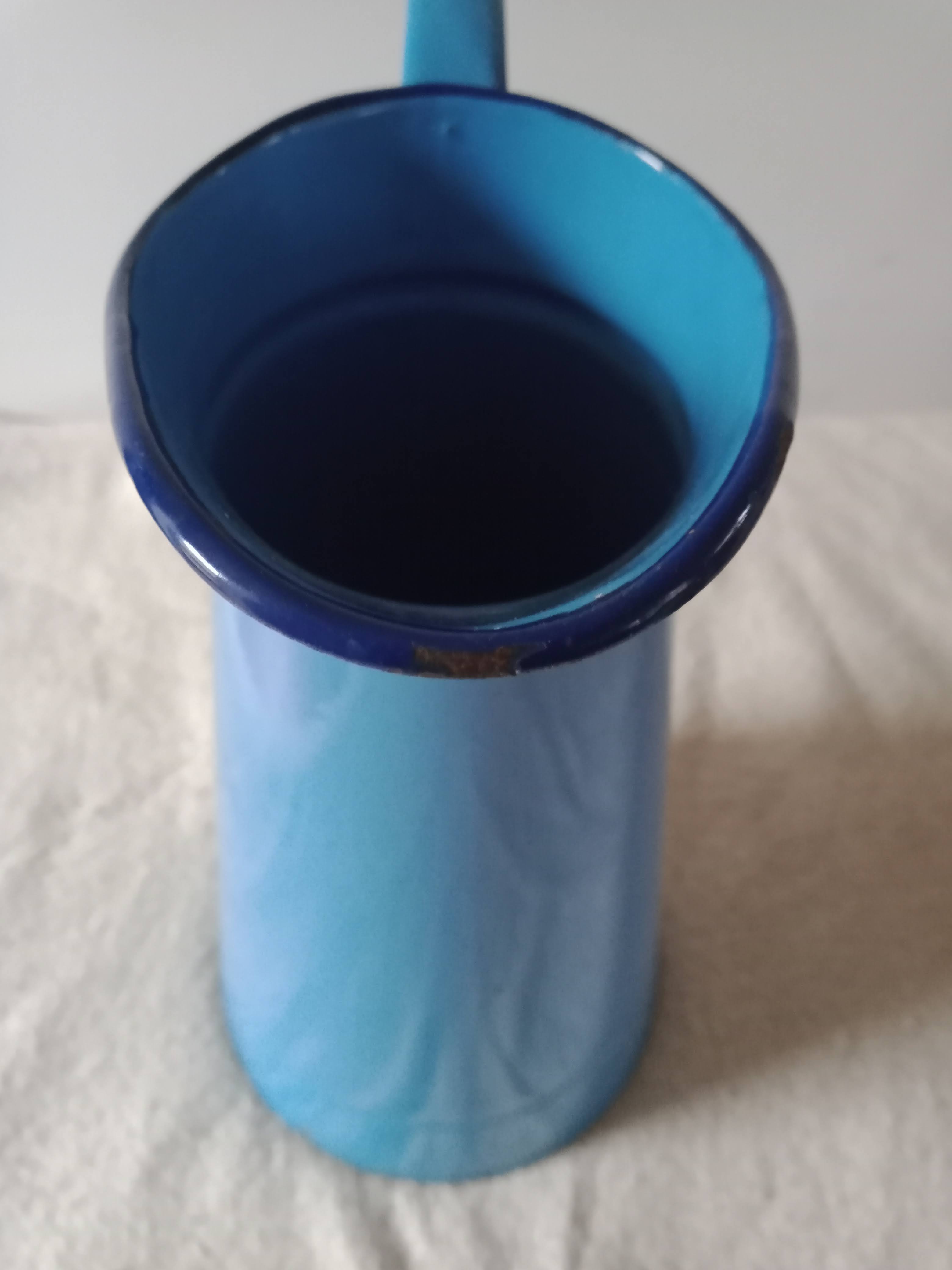 Old broc in blue enamelled sheet metal