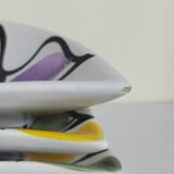 Three vintage free-form ceramic ravine dishes from the 1950s