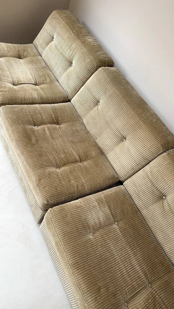 Three vintage seating elements with corduroy fabric