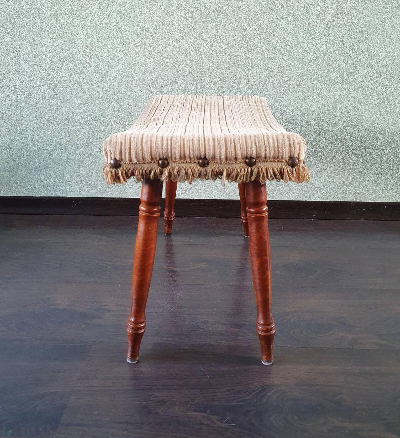 Vintage wooden footrest with 1970 fringed fabric coating
