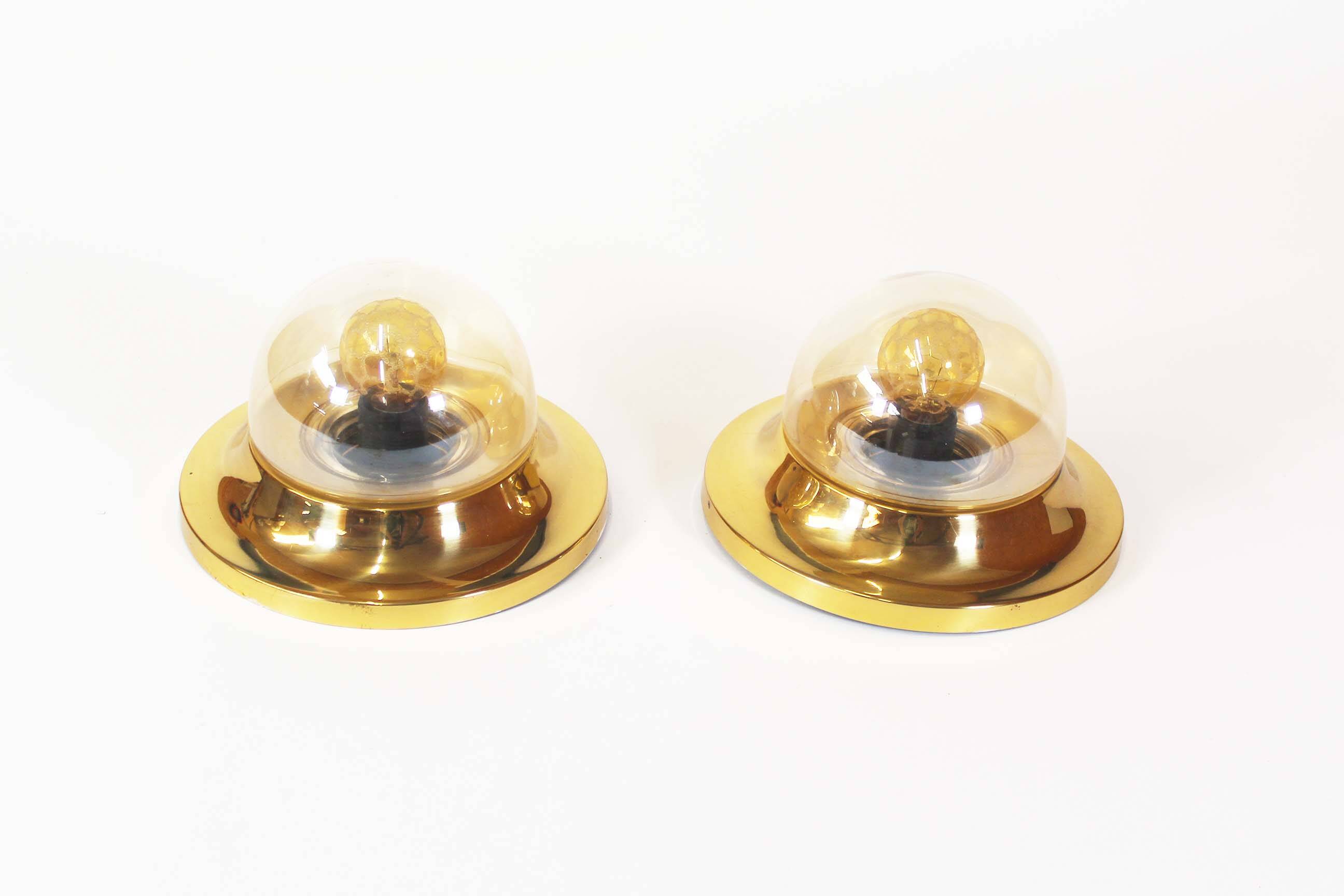 Pair of 1970’s petite brass & glass wall lights