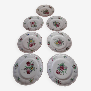 7 assiettes en porcelaine de Lunéville