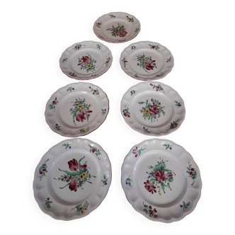 7 assiettes en porcelaine de Lunéville