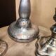 Set of three silver candle holders
