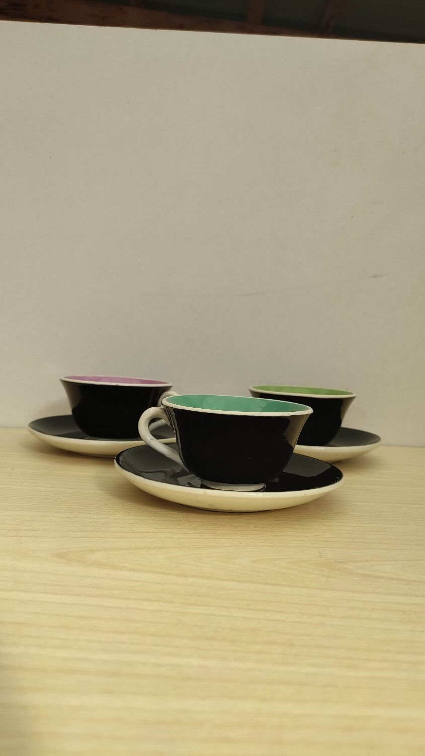 Coffee cups with saucers