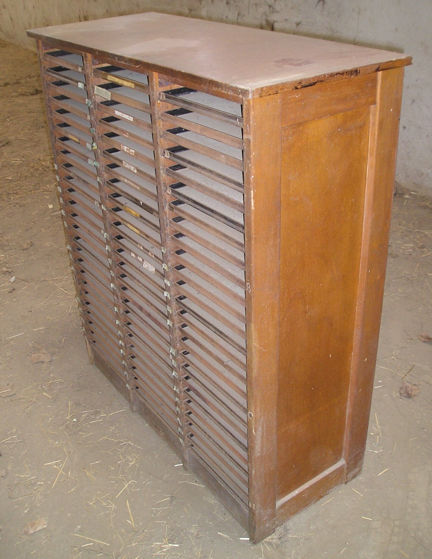 Furniture for printing trades with 75 metal drawers
