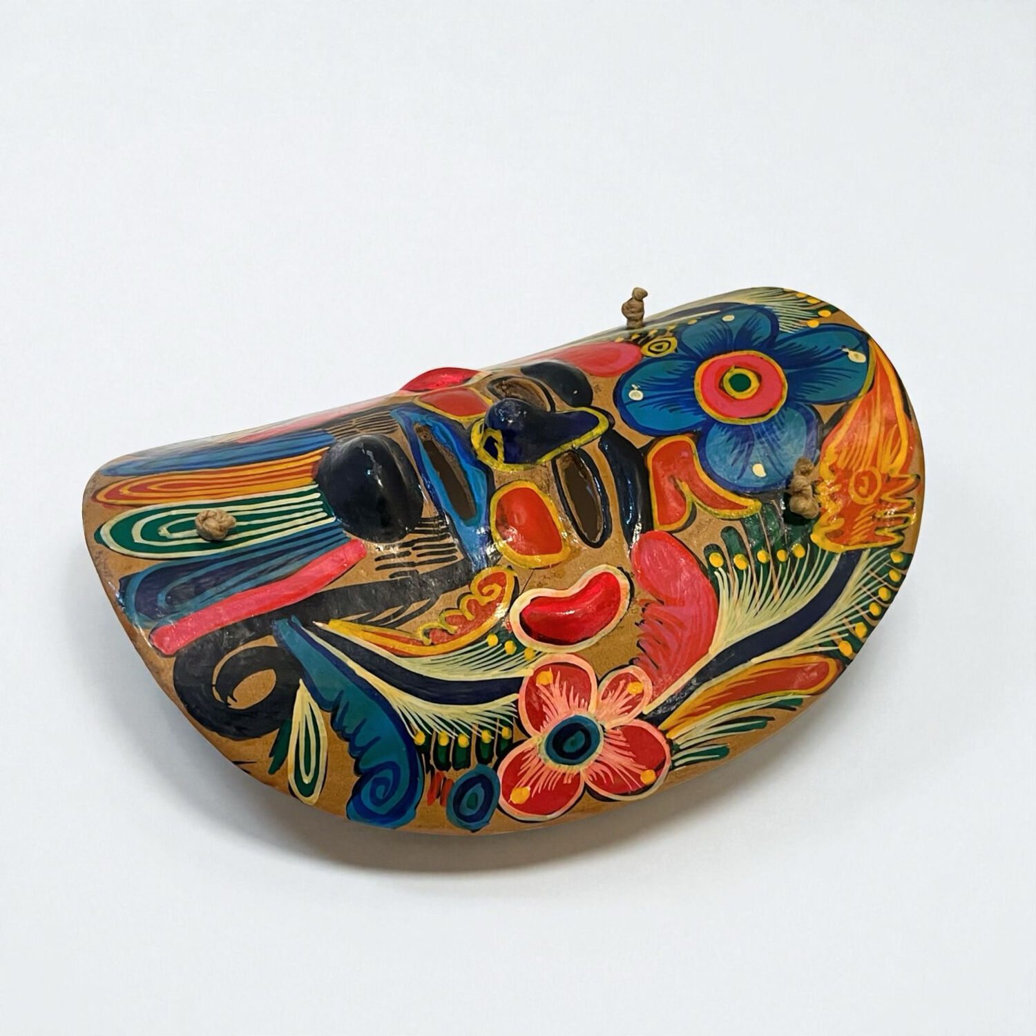 Mexican folk art mask in colored terracotta, 1970s