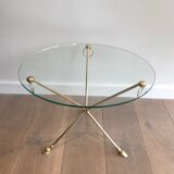 Round coffee table of neoclassical style in brass