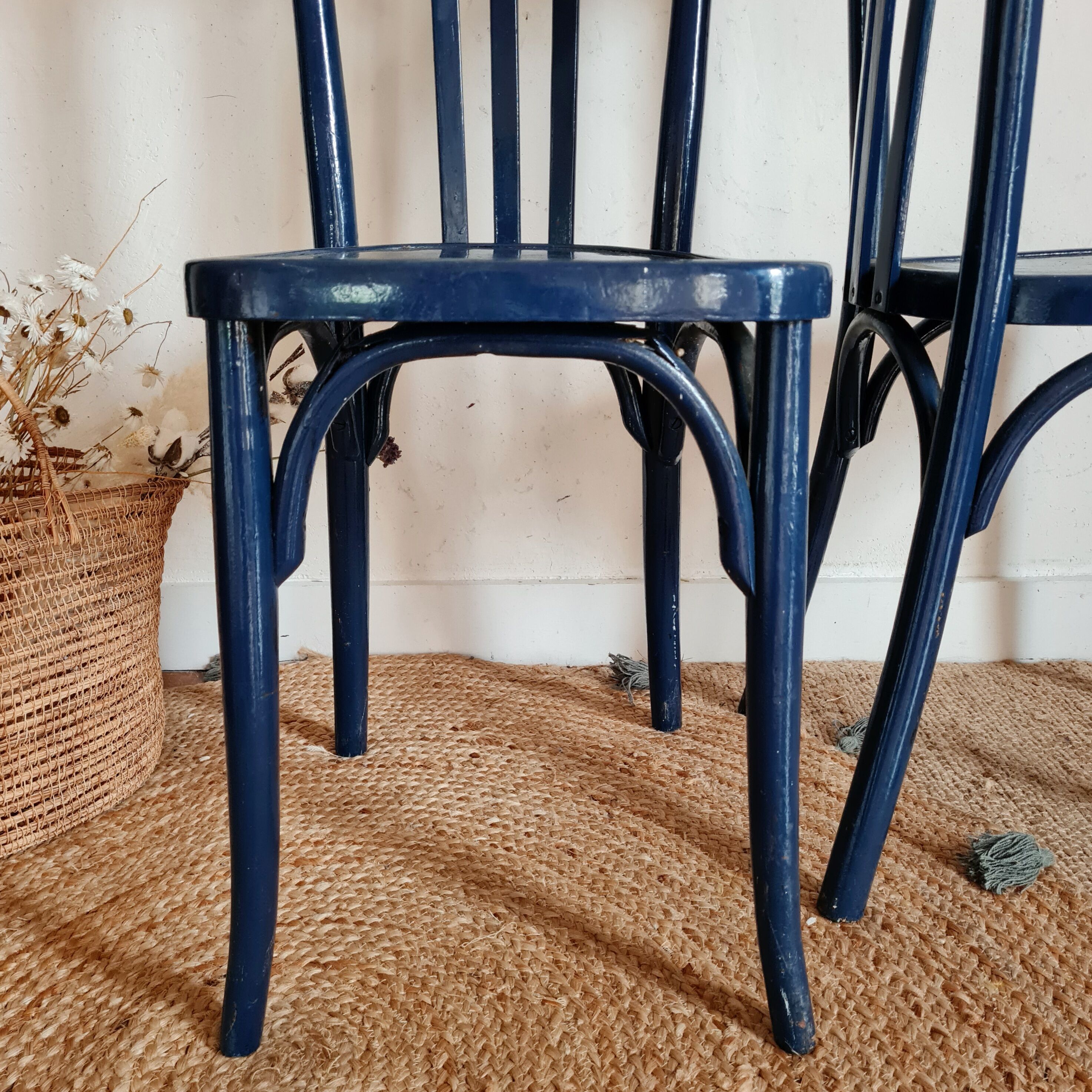 Duo of old blue bistro chairs