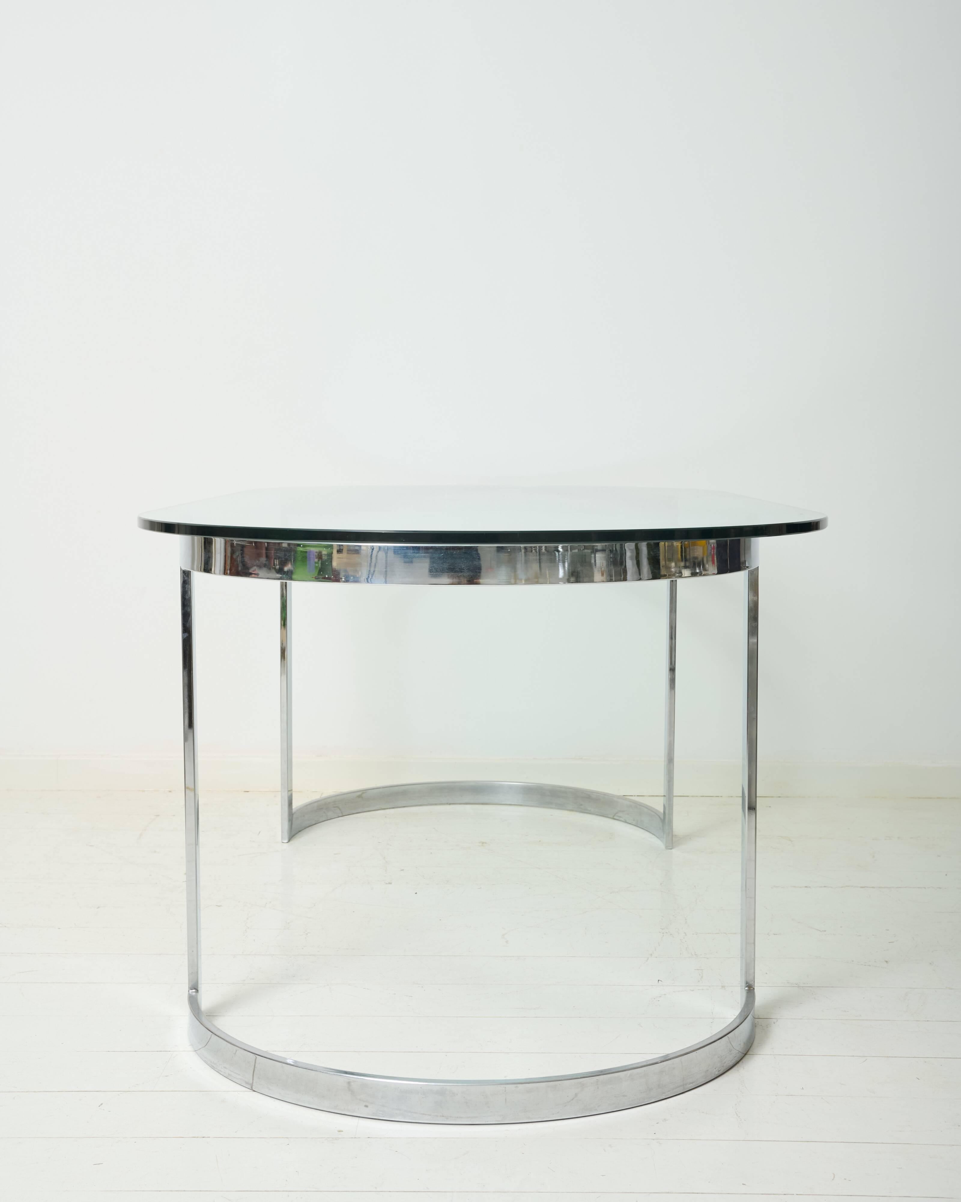 Dining table with a circular base.