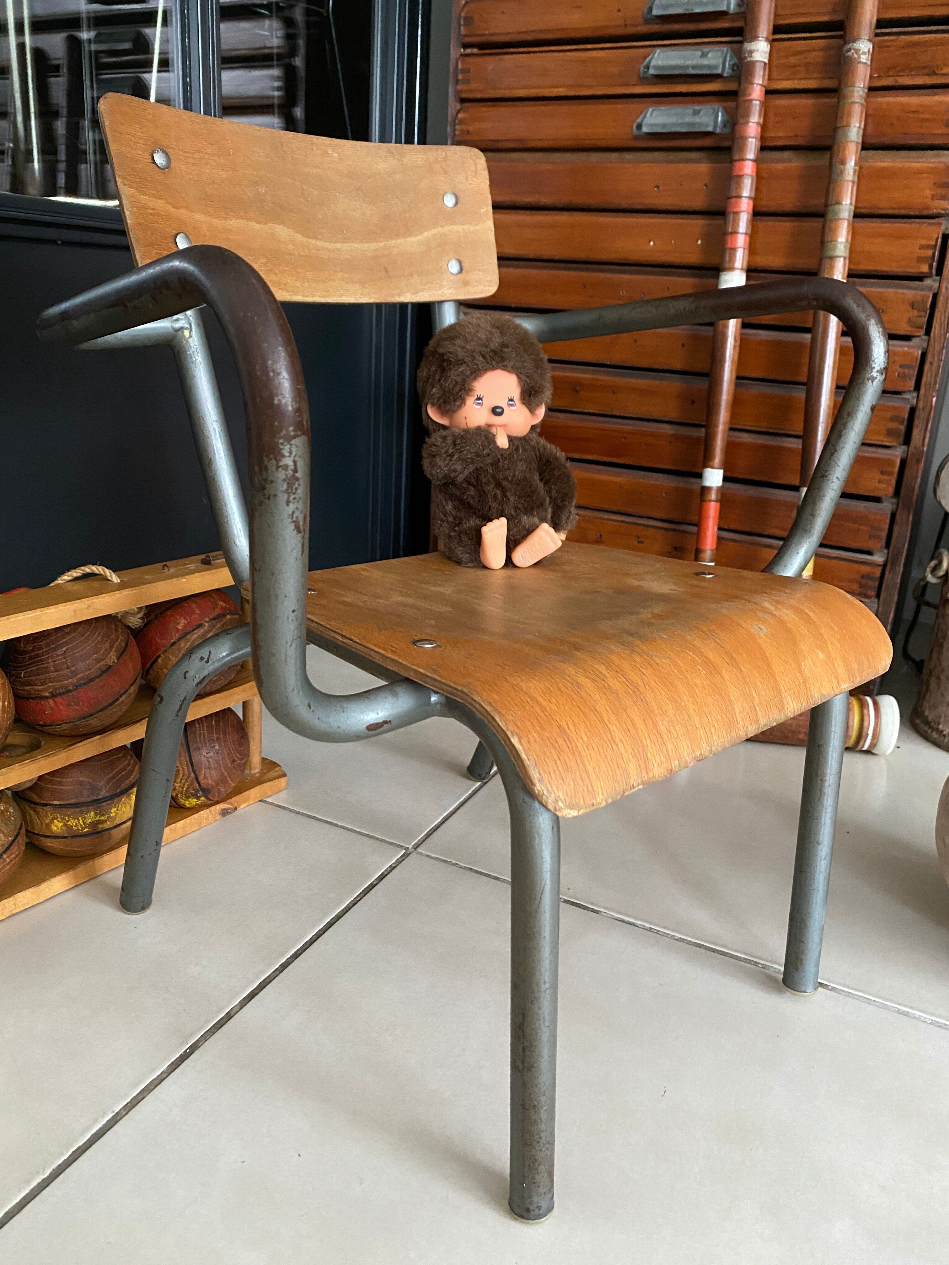 Old Mullca school chair with armrests