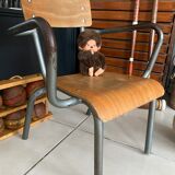 Old Mullca school chair with armrests