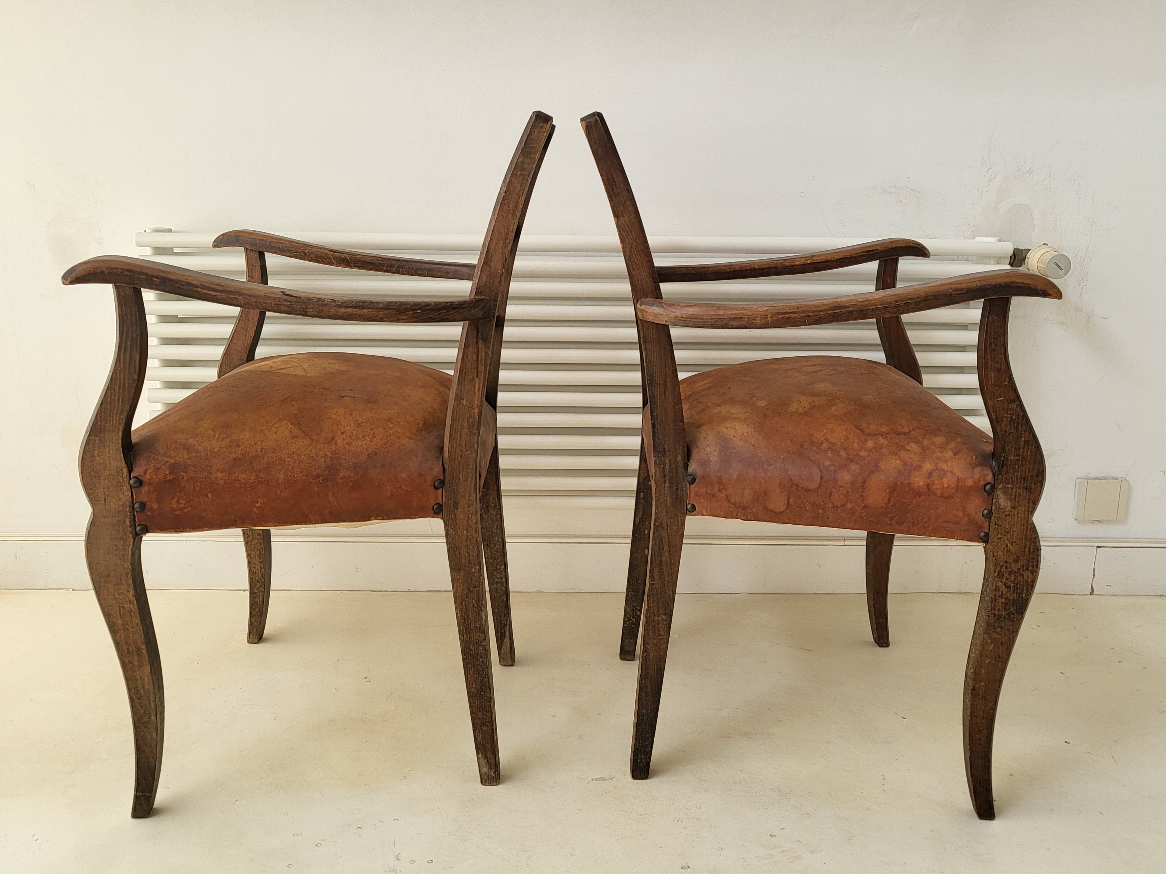 Pair of vintage leather armchairs