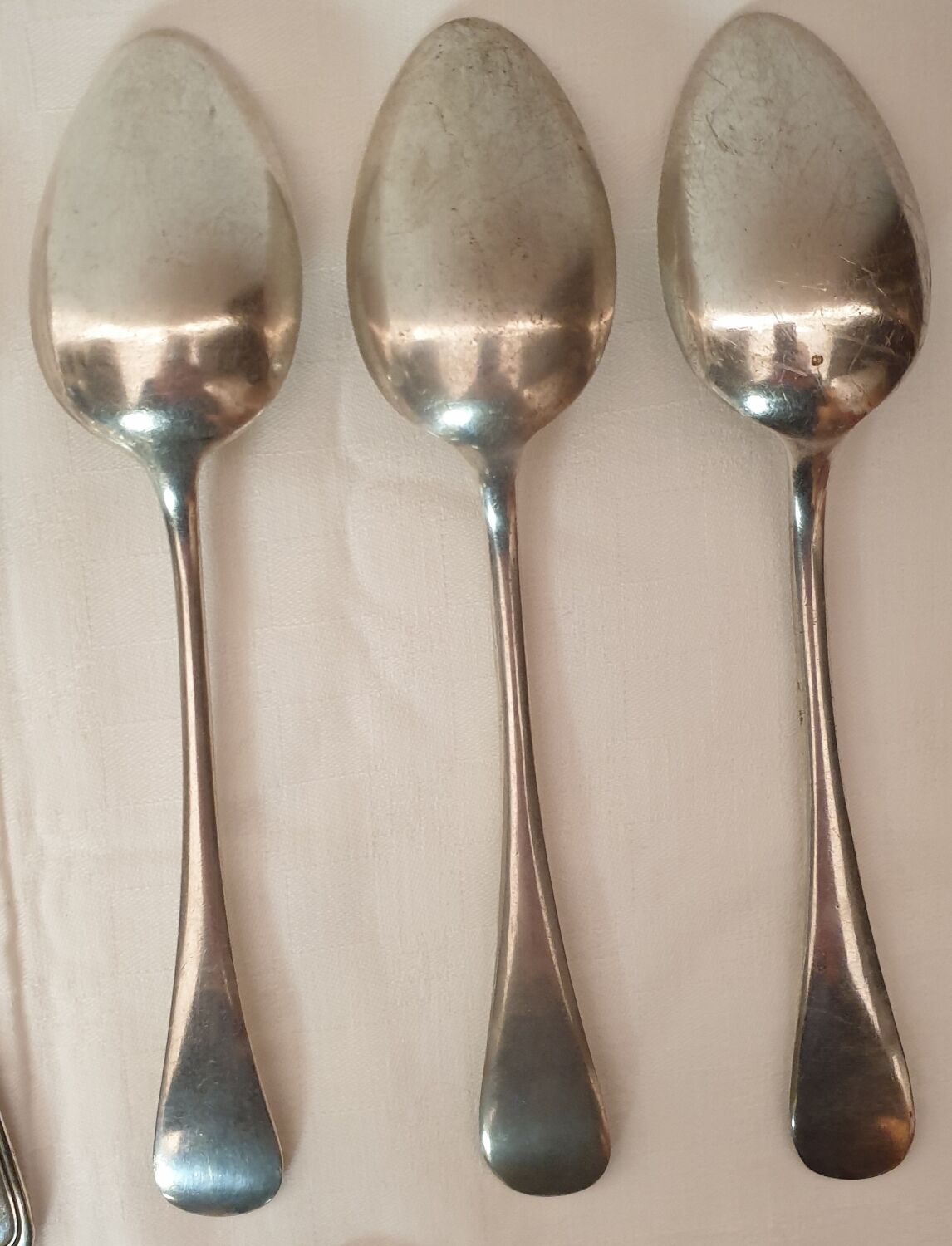 15 spoons & 4 silver metal forks