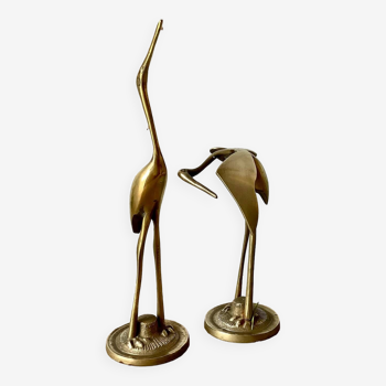 Couple of brass herons